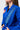 Tonal blue Gracie Barra lapel patch with navy lettering on the blue Ripstop Lightweight womens kimono jacket, with red contrast stitching
