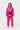 Student wearing the pink Gracie Barra Ripstop Lite Womens Kimono by adidas with the Barra Shield, Gracie Barra lapel patch and purple adidas sleeve logo.