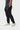 Side view of the black Ripstop Utility Pants showing the tonal Gracie Barra thigh embroidery, side seam and multi-row stitched cuff.