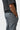 Back welt pocket on the gray Gracie Barra Ripstop Utility Pants with a red triangle woven tab, slanted side pocket and red bar tack stitching.