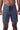 Front view of the charcoal Gracie Barra Red Shield Classic Premium Boardshort showing the straight leg fit, bar-tack reinforced fly, and black drawcords.