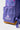 Close-up of Purple Sakura Backpack side pocket showing floral pattern, Brazilian Jiu-Jitsu logo, and brown suede bottom panel