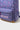 Close-up of Purple Sakura Backpack with floral pattern, Gracie Barra logo, front zippered pocket, and brown suede bottom panel