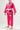 Front three-quarter view of kids model wearing Sakura V3 pink BJJ Gi with Gracie Barra lapel detail, Red Shield logos, and Sakura embroidery on pants.