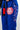 Close-up of Sakura V3 Women’s Kimono blue pants featuring large Red Shield logo and pink Sakura embroidery along the leg