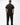 Stacked Button Up in Black — full back view on model showing the clean back yoke and curved hem of the short-sleeve button-up.
