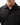 Stacked Button Up in Black — chest close-up showing the collar, front buttons, and left chest pocket on the short-sleeve shirt.