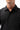 Stacked Button Up in Black — chest close-up showing the collar, front buttons, and left chest pocket on the short-sleeve shirt.