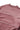 Close-up of the back neckline of the women’s Gracie Barra stacked relaxed fleece pullover in Mocha Mauve, showing subtle “Jiu-Jitsu” embroidery, white horizontal piping, ribbed collar, and soft brushed fleece fabric on a white background.