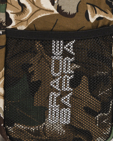 Close-up of camouflage crossbody bag with black mesh pocket and vertical Gracie Barra stacked logo