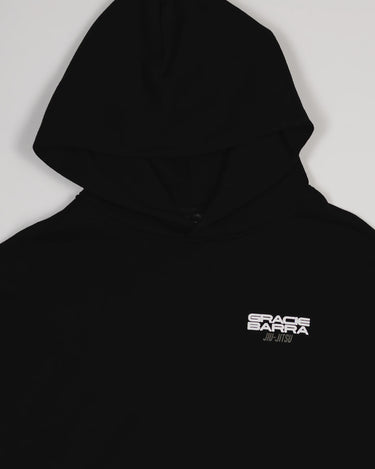 Close-up of chest area with white Gracie Barra Jiu-Jitsu logo on black Tactical Men’s Hoodie.