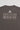 Close-up of back print on Tactical Women’s Tee in gray featuring Legacy G logo and “Brazilian Jiu-Jitsu” text, displayed on a light gray background.