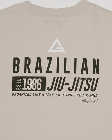 Close-up of back print on beige Tactical Women’s Tee with “Brazilian Jiu-Jitsu” text and graphic logo design.