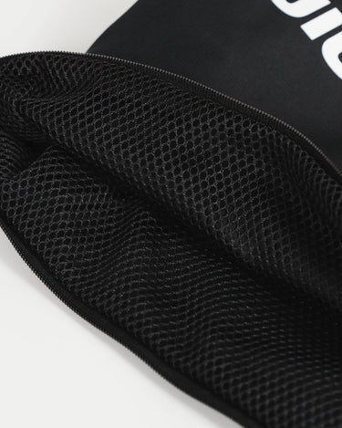 Close up of Black GB Tech Wash Bag with internal mesh laundry compartment and durable zipper closure, designed for easy machine washing.