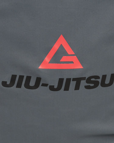 Close-up of grey GB Tech Wash Bag featuring the red Legacy G logo and black Jiu-Jitsu text on PU-coated ripstop fabric.