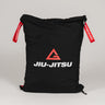 GB Tech Wash Bag in black with red drawstrings, featuring the Legacy G and Jiu-Jitsu logo, made from durable PU-coated ripstop for odor containment.