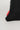 Detail of GB Tech Wash Bag in black showing red woven tab with Jiu-Jitsu branding, part of odor-control ripstop design.