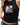 Unified Womens Tank, black — chest close-up of the weathered graphic: Legacy G over red-and-white stripes with the stacked Gracie Barra wordmark below.