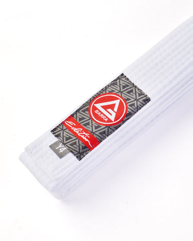 Folded GB Edition Youth White Belt on a white background, featuring the Red Shield patch, Edition label, and reinforced stitching.