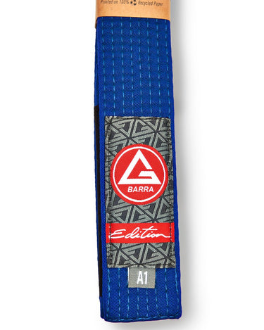 Vertical view of the Blue GB Edition Adult Belt highlighting the Red Shield patch, Edition label, and size tag.