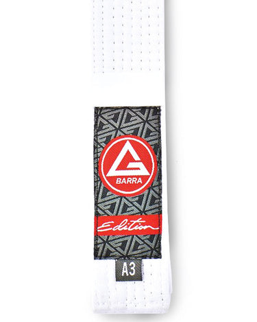 Vertical close-up of the GB Edition Light Adult Belt showing the Red Shield label, patterned patch, reinforced stitching, and size tag.