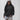 Emblem Womens Hoodie in Black — video of model turning to show the front tonal Gracie Barra emblem, oversized fit, and textured Jiu-Jitsu back detail.