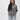 Emblem Womens Hoodie in Gray — video showing front, side, and back views with the tonal Gracie Barra chest emblem and Legacy G Jiu-Jitsu back graphic.